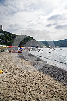 View of the beachfront in the bay. (vertical) photo