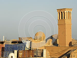 View of ancient windmills in Kashan and old buildings with domed roofs and beautiful decorations.