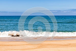 View of a beautiful atlantic ocean from Praia do Norte in Nazare, Portugal.