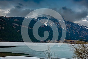 View into beautiful austrian landscape on cloudy spring day