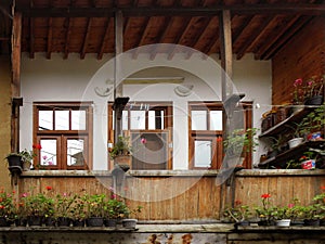 View a beautiful balcony with colorful flowers and mirrors, Masuleh city in north of Iran, Gilan. photo