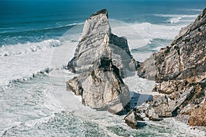 View of the beautiful cliffs and the Atlantic Ocean at the eastern point at Cape Roca in Portugal