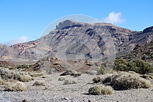 Desert-like landscape with the Mountain of Guajara in the background. photo