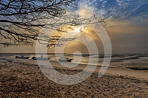 View of a beautiful deserted beach in the island of Orango at sunset, in Guinea Bissau. photo