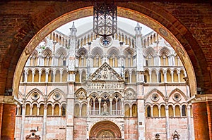 The view on the frontage of Ferrara Cathedral, Italy photo