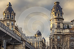 View of beautiful Haussmann buildings near Bir Hakeim bridge and Eiffel tower in Paris