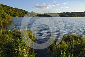 View of beautiful lake landscape, Accesa lake, Massa Marittima, Grosseto, Tuscany, Italy photo