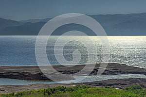 View of a beautiful light that shines on the dead sea in Israel in the early morning.