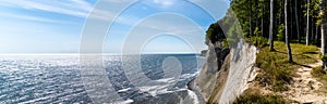 View of the beautiful lime and chalkstone cliffs in Jasmund National Park on Ruegen Island in Germany photo