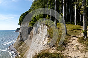 View of the beautiful lime and chalkstone cliffs in Jasmund National Park on Ruegen Island in Germany photo