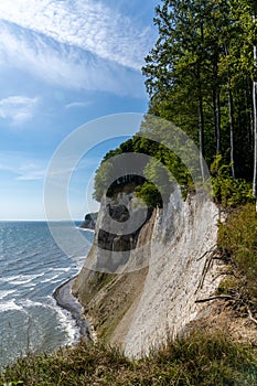 View of the beautiful lime and chalkstone cliffs in Jasmund National Park on Ruegen Island in Germany photo