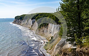 View of the beautiful lime and chalkstone cliffs in Jasmund National Park on Ruegen Island in Germany photo