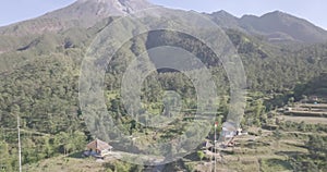 View of beautiful Merapi Mountain with the village below it in Yogyakarta, Indonesia