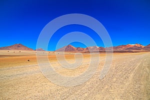 View of the beautiful mountain and Salvador Dali Siloli Desert in Uyuni Bolivia photo