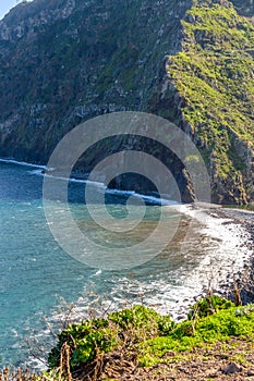 View of beautiful mountains and the ocean on the coast of the island of Madeira, Portugal
