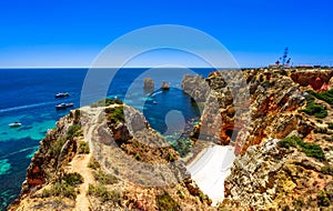 View on beautiful sandy beach near Lagos in Ponta da Piedade, Algarve region, Portugal Keywords