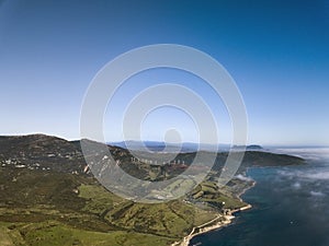 View of beautiful Spanish Landscape in Tarifa Area, Province of Cadiz. Beautiful aerial of green hills wind turbines with