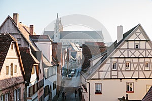 View of a beautiful street with traditional German houses in Rothenburg ob der Tauber in Germany. European city.