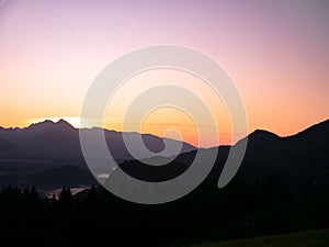 View on the beautiful sunrise over the majestic hills with the Lake Bled in Slovenia