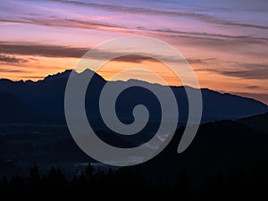 View on the beautiful sunrise over the majestic hills with the Lake Bled in Slovenia