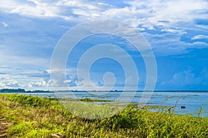 View of beautiful sunset with blue sky in Dau Tieng lake, Tay Ninh province, Vietnam