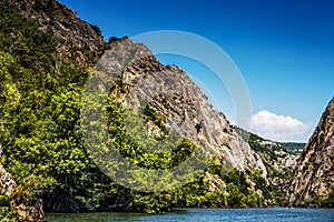 View of beautiful tourist attraction, the idyllic Matka Lake  at Matka Canyon in the Skopje surroundings. Macedonia. Mountains