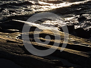 View of beautiful wave and rocks on the coast of Baltic sea, Sveaborg, Finland