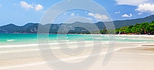 View of beautiful white sand beach with turquoise water of Chaweng beach, in Koh Samui, Thailand