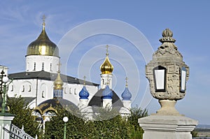 View on beautiful white stone lantern with orthodox cathedral