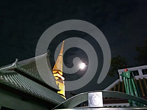 full moon and golden stupa, Thailand