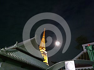 full moon and golden stupa, Thailand