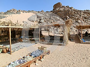 view of bedouin tent for tourists with clear blue sky above it, sharm el sheik, egypt