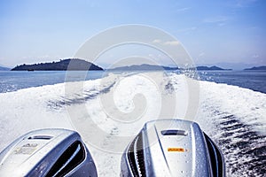 View behind the speed boat with sea and wave