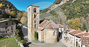 View of the bell tower and the apse of the Romanesque church of Beget, Spain