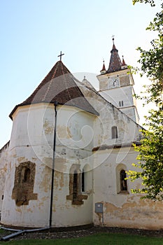 View of the bell tower of historical Church-fortress in the city of Harman. Transylvania. Romania