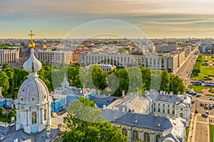 View from bell tower of Smolny Cathedral to historic centre of Saint-Petersburg in sunny summer evening. Panoramic cityscape of St