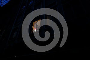 View from below at the light coming from one window