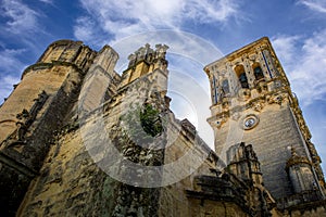 View from below of the minor basilica of Santa MarÃ­a de la AsunciÃ³n in Arcos de la Frontera, Cadiz photo