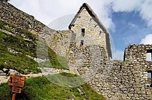 View from below of some perfectly preserved houses belonging to the Inca archaeological complex of Machu Picchu