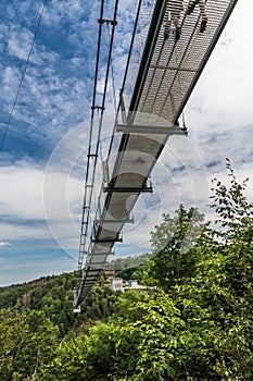 View from below of the Titan RT rope suspension bridge over the Rappbodetalsperre in the Harz Mountains in Germany