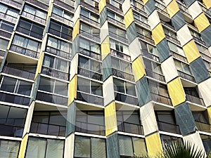 View from below of the unique facade of a building of modern architecture in ViÃÂ±a del Mar photo