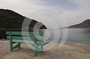View from bench on harbor romantic Assos, Kefalonia, Greece