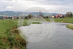 View of Bialy Dunajec river in the city of Nowy Targ