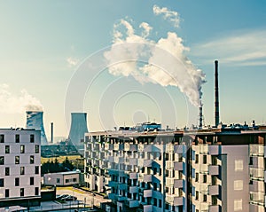 View of the Big chimneys in a city / Pollution problem
