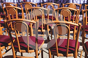 View of big concert hall theater before the show, empty venue for philharmoniÑ opera with audience, line of wooden chairs,