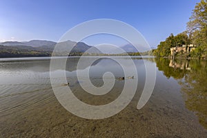 View of the big lake of Avigliana (Lago Grande), in the province of Turin, Piedmont, Italy