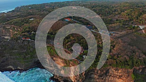 View on big ocean waves and rocks at the Uluwatu Temple, at the Bali island, Indonesia