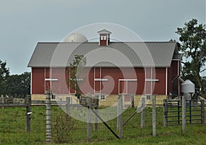 A view of the big red barn and the corrals from the roadway