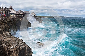 View of big waves at Crystal Cove small island near Boracay island in the Philippines