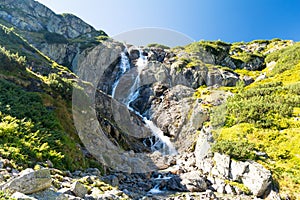 View on the biggest waterfall Siklawa in Tatra mountains, Poland